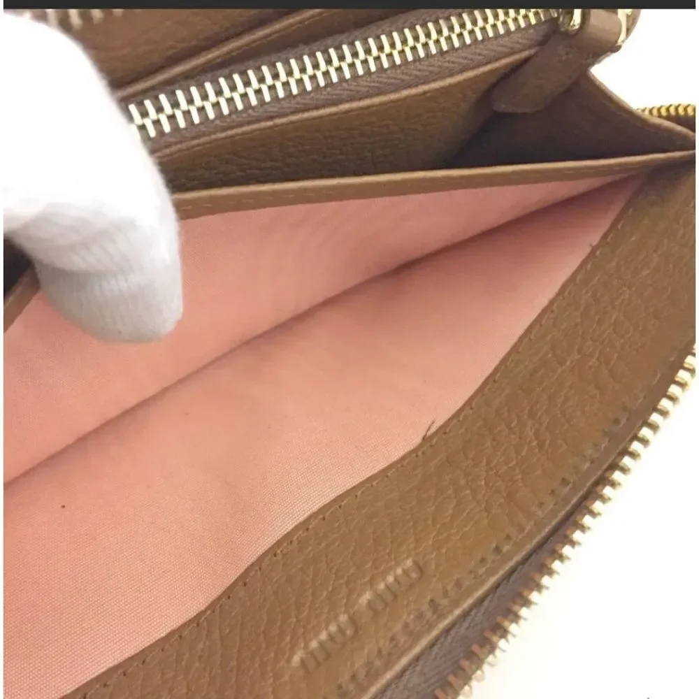 Authentic MIU MIU Ribbon Leather Zip Long Wallet/S2257. 194